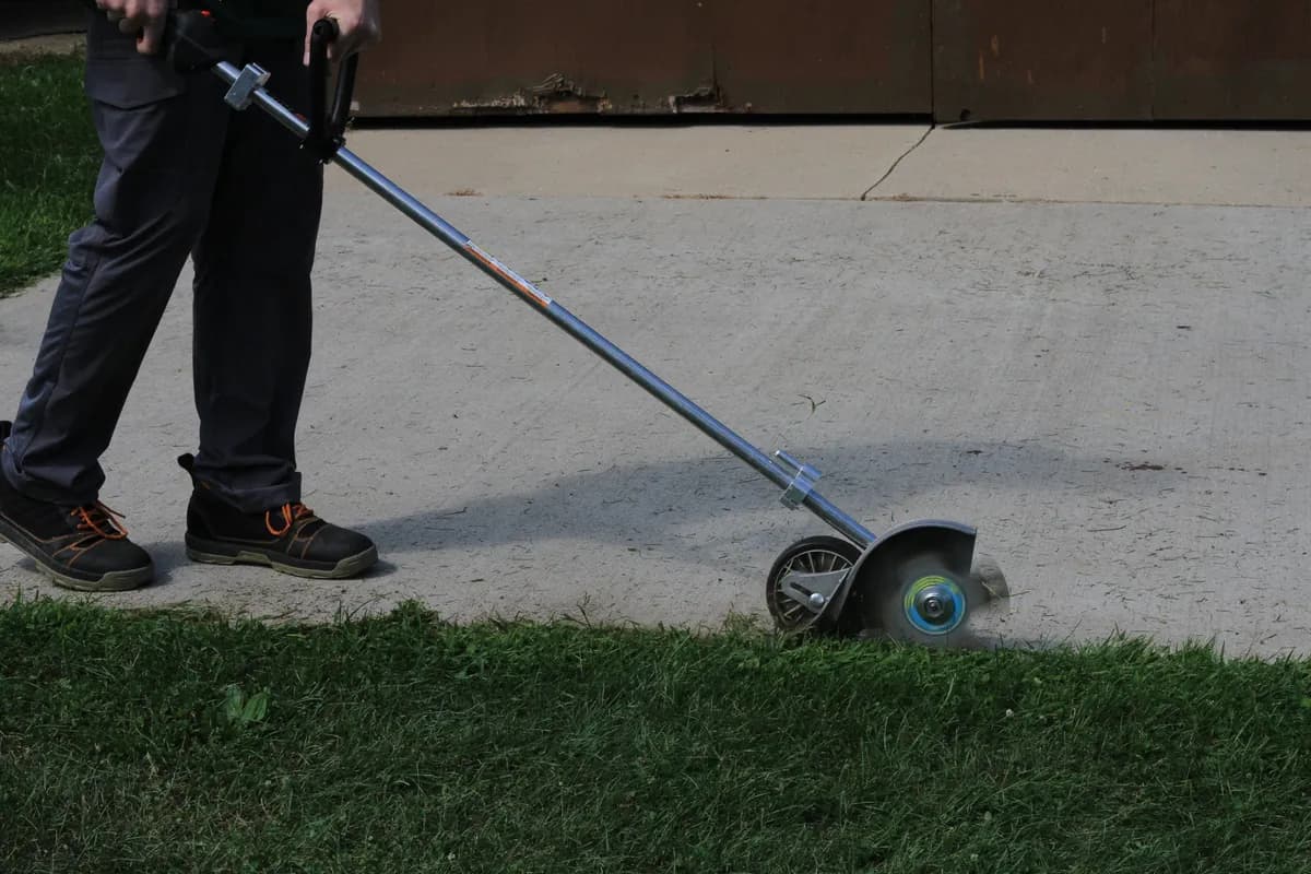 Close-up of clean mower stripes across a green lawn